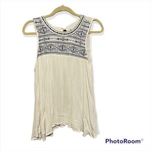 White sleeveless bohemian style shirt